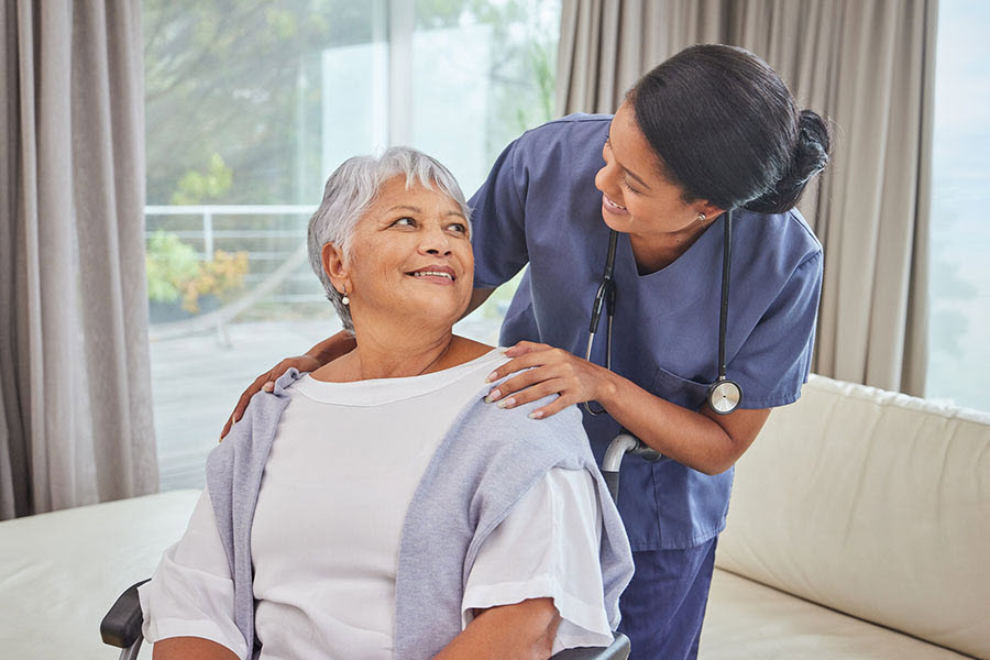 Provider talking to a senior woman